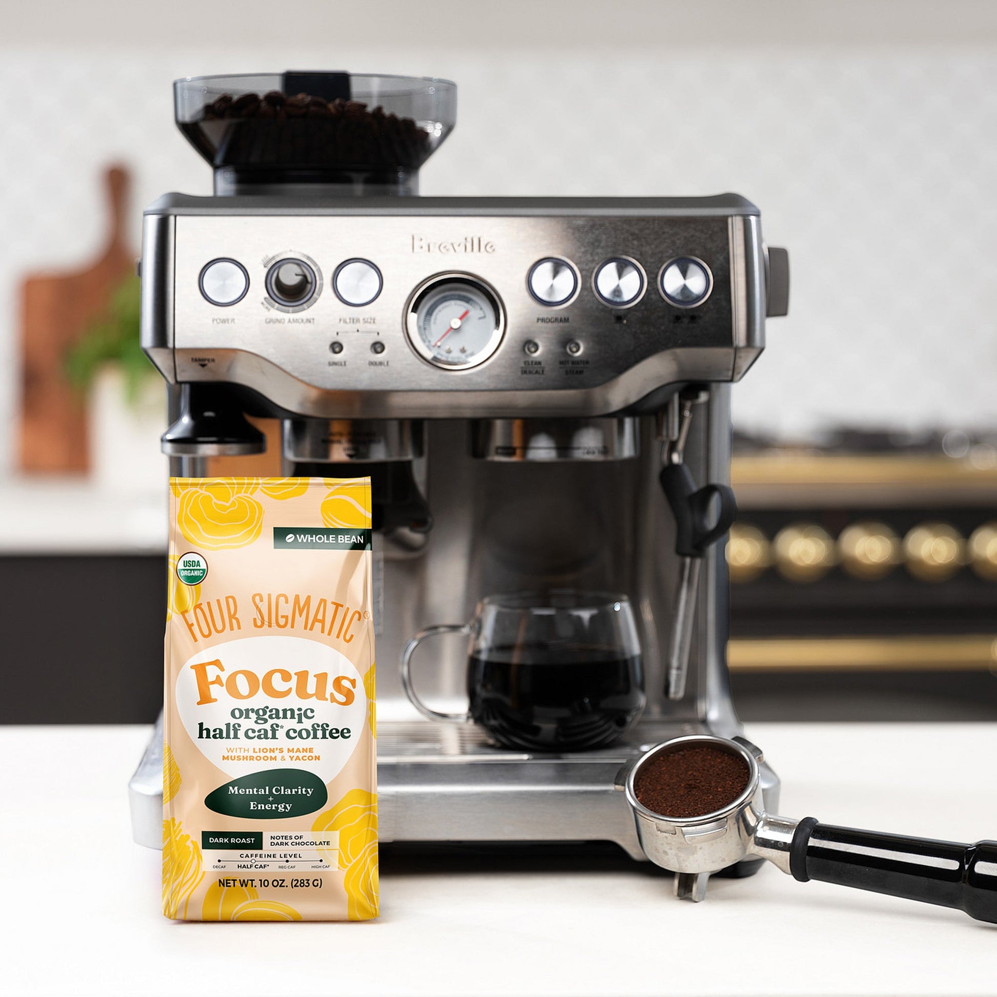 focus-half-caf-whole-bean-coffee-u9 Focus_Org_Dark_Roast_High_Caf_Kitchen_Pour_Woman_4_47b71a0c-c7fc-40fd-a2bc-fa7389dfb410.jpg